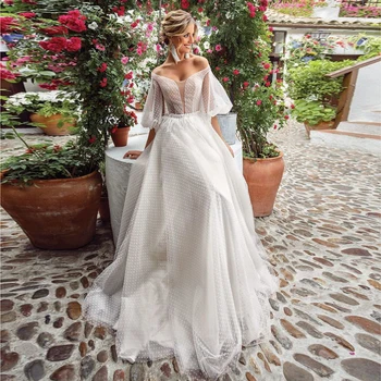 Verngo A line Beach Wedding Dress 2020 Elegant Boho Wedding Gowns Half Sleeves Bridal Dress Vestido De Noiva Sereia
Verngo A line Beach Wedding Dress 2020 Elegant Boho Wedding Gowns Half Sleeves Bridal Dress Vestido De Noiva Sereia