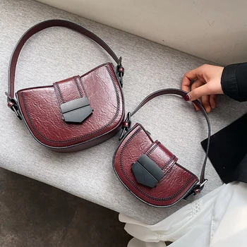AXUKES Women's Bag 2020 New Ladies Handbag Brand Original Design Saddle Bag Retro Messenger Bag Fashion Shoulder Bag
AXUKES Women's Bag 2020 New Ladies Handbag Brand Original Design Saddle Bag Retro Messenger Bag Fashion Shoulder Bag