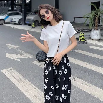 Casual Fashion O-Neck Solid Top And Ankle-Length Floral Print Wide Leg Pants Set Women
Casual Fashion O-Neck Solid Top And Ankle-Length Floral Print Wide Leg Pants Set Women