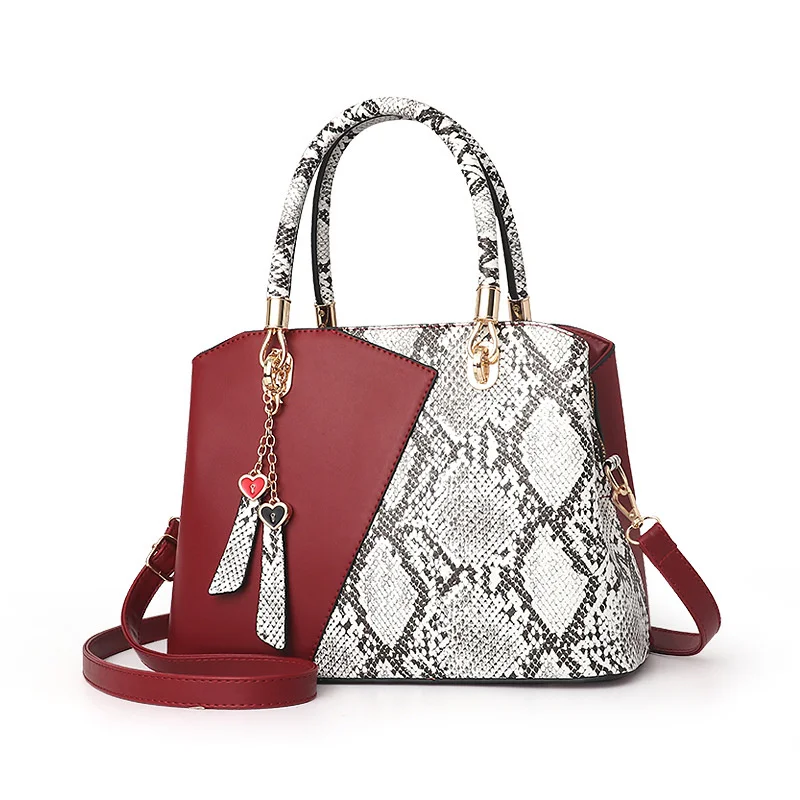 European and American Style Splicing Texture Fashion Handbag High-end Bag Female 2019 New Fashion Snake Pattern Shoulder Bag
European and American Style Splicing Texture Fashion Handbag High-end Bag Female 2019 New Fashion Snake Pattern Shoulder Bag