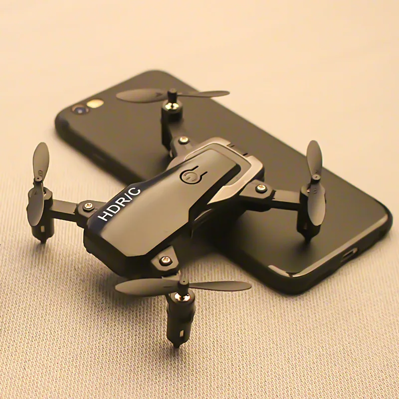 Mini Folding Quadcopter Pressure Set High Aerial Photography Unmanned Plane Model Remote Control Toy
Mini Folding Quadcopter Pressure Set High Aerial Photography Unmanned Plane Model Remote Control Toy
