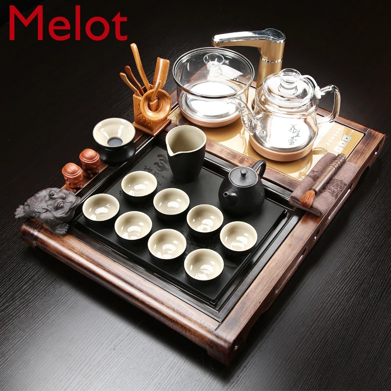 Tea Set Household Automatic Four-in-One Modern Simple Black Stone Small Tea Tray Ceramic Kung Fu Tea Making Drink
Tea Set Household Automatic Four-in-One Modern Simple Black Stone Small Tea Tray Ceramic Kung Fu Tea Making Drink