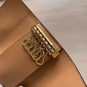 L-62630 Luxury Designer Women Men Unisex 6 Key Ring Holder Keyring Cover Holder Purse Genuine Leather AAA Grade 26 Colors
L-62630 Luxury Designer Women Men Unisex 6 Key Ring Holder Keyring Cover Holder Purse Genuine Leather AAA Grade 26 Colors