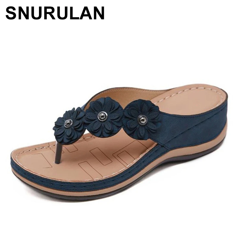 SNURULAN Slippers on the platform women's sandals without a buckle Vietnamese on a flat sole with a floral print; summer sliders
SNURULAN Slippers on the platform women's sandals without a buckle Vietnamese on a flat sole with a floral print; summer sliders