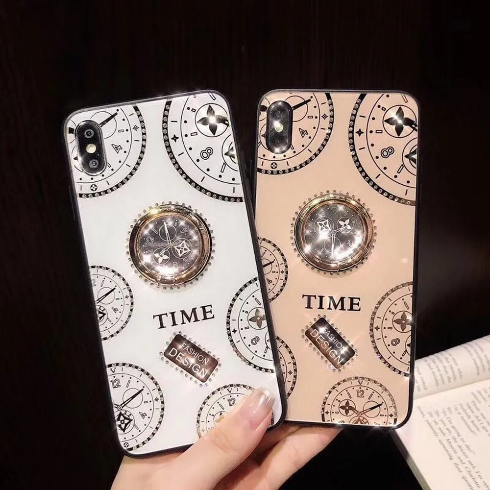 Diamond bracket clock pattern shell phone case For iPhone 11 Pro Max XR XS Max XS 7 8 plus Clock ring stand back cover coque
Diamond bracket clock pattern shell phone case For iPhone 11 Pro Max XR XS Max XS 7 8 plus Clock ring stand back cover coque