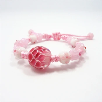 Hand-made Japanese style glass beads Pink Lotus beads bracelet hand string to bring luck and wealth and to ward off bad luck
Hand-made Japanese style glass beads Pink Lotus beads bracelet hand string to bring luck and wealth and to ward off bad luck