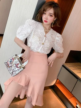 Fashion Fairy Patch Tassel Puff Sleeve Top + Irregular Ruffled Skirt Suit Women's Fashion Summer New Style
Fashion Fairy Patch Tassel Puff Sleeve Top + Irregular Ruffled Skirt Suit Women's Fashion Summer New Style