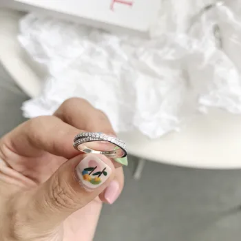 Leouerry 925 Sterling Silver Overlapping Cross Rings Fashion Bright Zircon Rings for Women Temperament Wild Jewelry 9/13/17
Leouerry 925 Sterling Silver Overlapping Cross Rings Fashion Bright Zircon Rings for Women Temperament Wild Jewelry 9/13/17