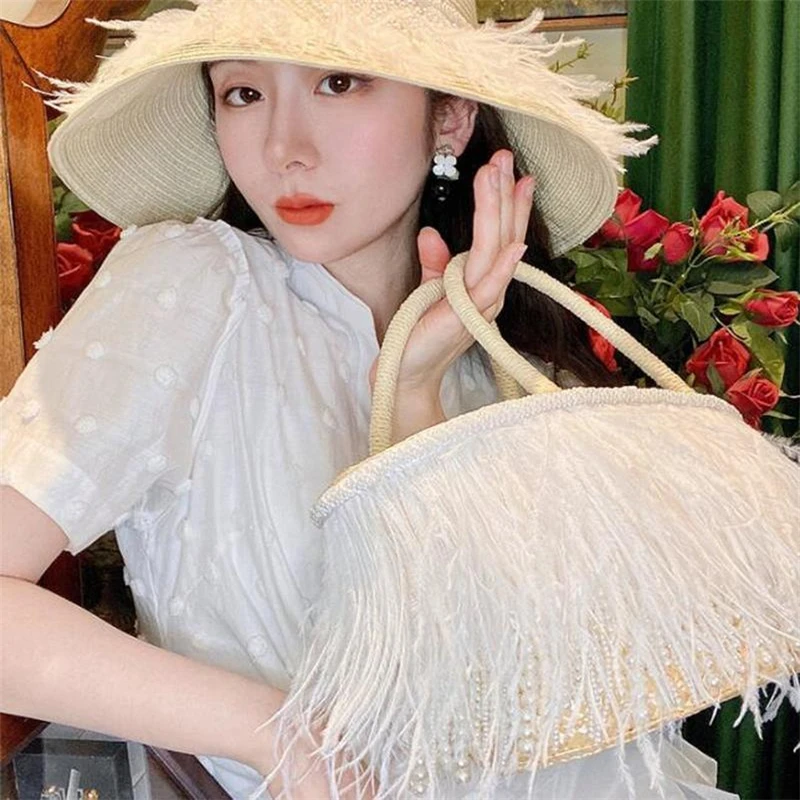 Luxury pearl tassel Straw Bag 2021 Summer Beach Bags For Ladies Handmade Feather Totes For Travel Tesigner Purse with Sun Hat
Luxury pearl tassel Straw Bag 2021 Summer Beach Bags For Ladies Handmade Feather Totes For Travel Tesigner Purse with Sun Hat