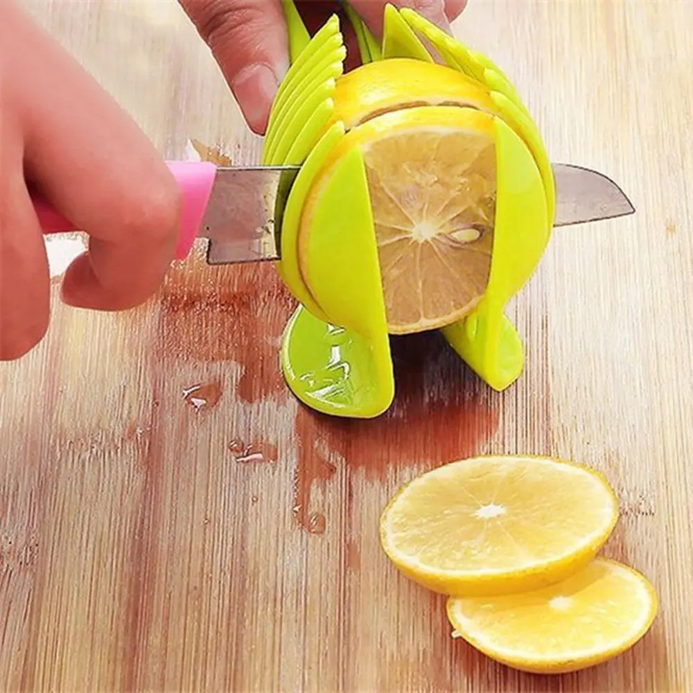 Hot 1pc Tomato Slicer Plastic Fruits Cutter Tool Perfect Slicer Tomato Potato Onion Shreadders Slicer Lemon Cutting Holder Tools
Hot 1pc Tomato Slicer Plastic Fruits Cutter Tool Perfect Slicer Tomato Potato Onion Shreadders Slicer Lemon Cutting Holder Tools