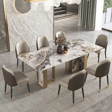 Modern light luxury rock slab dining table home rectangular simple high-end explosive dining table and chairs combination
Modern light luxury rock slab dining table home rectangular simple high-end explosive dining table and chairs combination