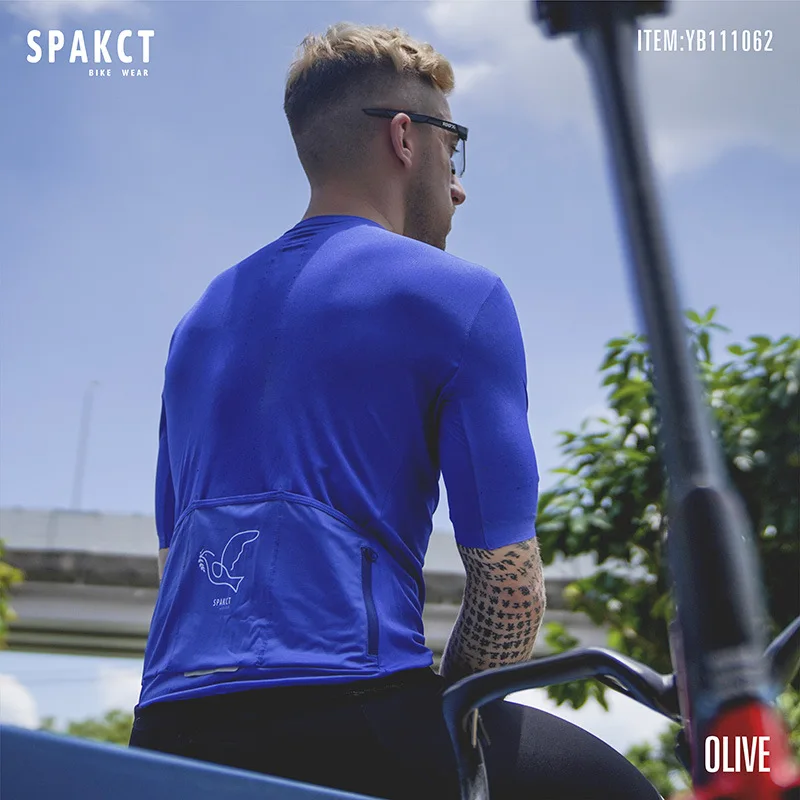 Spakct Breathable Unisex Cycling Jersey Spring Summer Anti-skip Hem Bike Clothing Pro Road Team Bicycle Jersey 3 Back Pockets
Spakct Breathable Unisex Cycling Jersey Spring Summer Anti-skip Hem Bike Clothing Pro Road Team Bicycle Jersey 3 Back Pockets