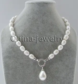 Wholesale price AAA 18 " 13-14mm natural white freshwater pearl necklace + 20mm shell pendant 
Wholesale price AAA 18 " 13-14mm natural white freshwater pearl necklace + 20mm shell pendant
