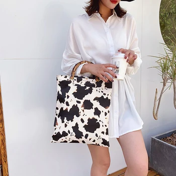 Vintage Women Cow Milk Handbag Bamboo Handle Big Capacity Tote Shopping Bag PU Leather Large Capacity Female Portable Daily Bags
Vintage Women Cow Milk Handbag Bamboo Handle Big Capacity Tote Shopping Bag PU Leather Large Capacity Female Portable Daily Bags