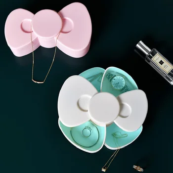 Rotatable Bow Jewelry Storage Box 360 Degree Rotating Earrings Makeup Organizer Portable Hairpin Rope Case Desktop Organization
Rotatable Bow Jewelry Storage Box 360 Degree Rotating Earrings Makeup Organizer Portable Hairpin Rope Case Desktop Organization