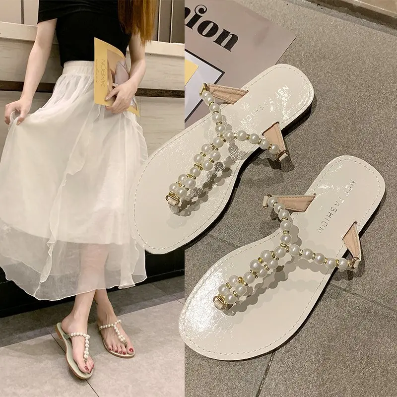 

2020 summer new pearl clip toe sandals fashion wild flat bottom wear sandals female fairy wind beach sandals and slippers Z930