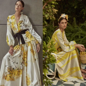 European and American show the new fairy temperament retro v-neck Lantern Sleeve Belt print long dress 
European and American show the new fairy temperament retro v-neck Lantern Sleeve Belt print long dress