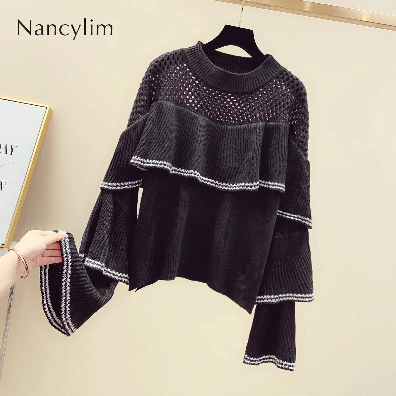 Korean Street Pullovers Womans Autumn New Hollow Out Ruffles Stitching Loose Horn Sleeve Knitted Sweater Coat Lady Pull Jacket
Korean Street Pullovers Womans Autumn New Hollow Out Ruffles Stitching Loose Horn Sleeve Knitted Sweater Coat Lady Pull Jacket