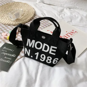 Korean children's bags autumn and winter new boys and girls canvas shoulder handbag letter printing parent-child satchel
Korean children's bags autumn and winter new boys and girls canvas shoulder handbag letter printing parent-child satchel