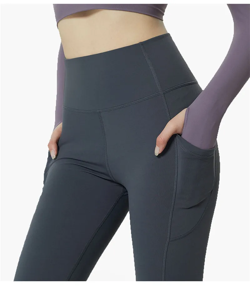 H14c7826c64f9426d83988cf2c05393696 - Zwarte gymnastieklegging met zakken Groothandel - Wholesale Gym Clothing Manufacturer| Worldwide Delivery