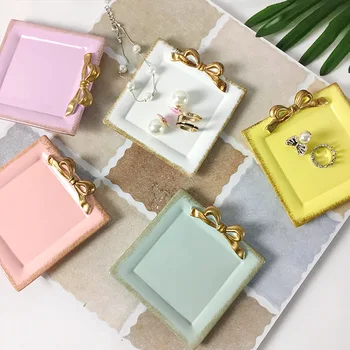 Bowknot Resin Crafts Snack candy cake storage tray Rings Jewelry dish Snack dish for wedding gifts square Plates Decoration 
Bowknot Resin Crafts Snack candy cake storage tray Rings Jewelry dish Snack dish for wedding gifts square Plates Decoration
