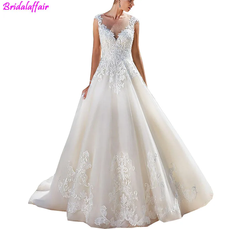 White Lace Applique Sleeveless Illusion Back A-Line Beach Wedding dress Bridal Gowns vestidos de novia Pluse size Bridal Dress
White Lace Applique Sleeveless Illusion Back A-Line Beach Wedding dress Bridal Gowns vestidos de novia Pluse size Bridal Dress