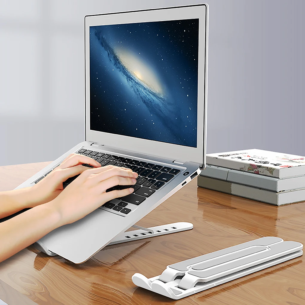Portable Laptop Stand Foldable Height Adjustable Support Base Computer Cooling Stand Hollow Design Laptop Holder
Portable Laptop Stand Foldable Height Adjustable Support Base Computer Cooling Stand Hollow Design Laptop Holder