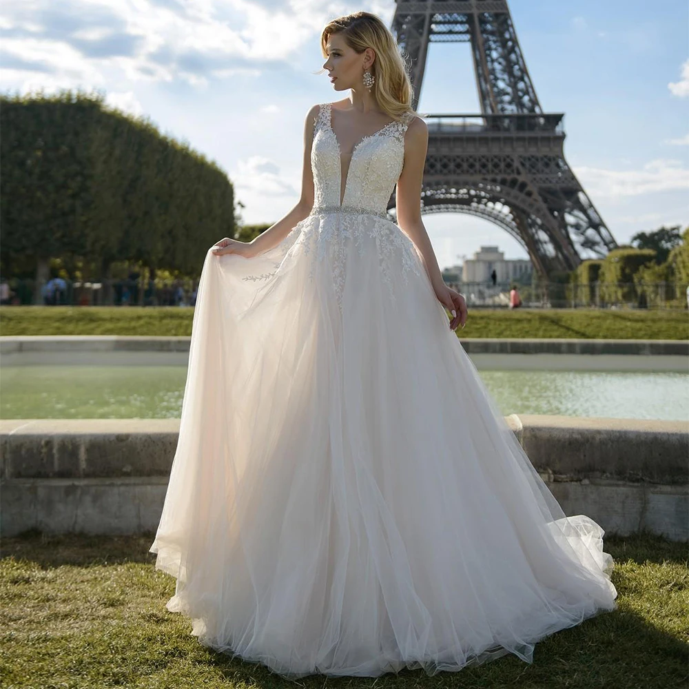 Elegant V-neck Sleeveless Wedding Dress 2020 A-line Applique Chapel Train Custom Made Tulle Bridal Gowns with Beadings
Elegant V-neck Sleeveless Wedding Dress 2020 A-line Applique Chapel Train Custom Made Tulle Bridal Gowns with Beadings