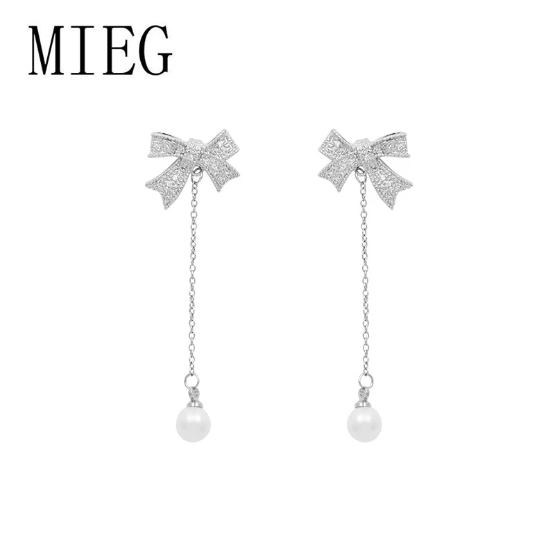 MIEG New Arrival Cubic Zirconia CZ Crystal Dangle and Chandelier Bow Drop Earrings for Women in White Gold Color
MIEG New Arrival Cubic Zirconia CZ Crystal Dangle and Chandelier Bow Drop Earrings for Women in White Gold Color
