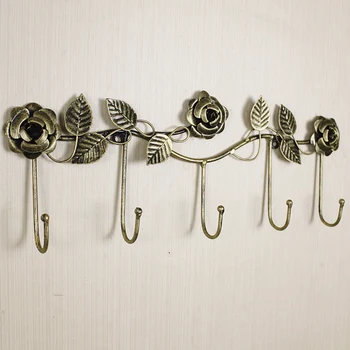 European-style iron rose design decorative wall hook wall-mounted coat hanger storage rack key holder organizer home decor 
European-style iron rose design decorative wall hook wall-mounted coat hanger storage rack key holder organizer home decor