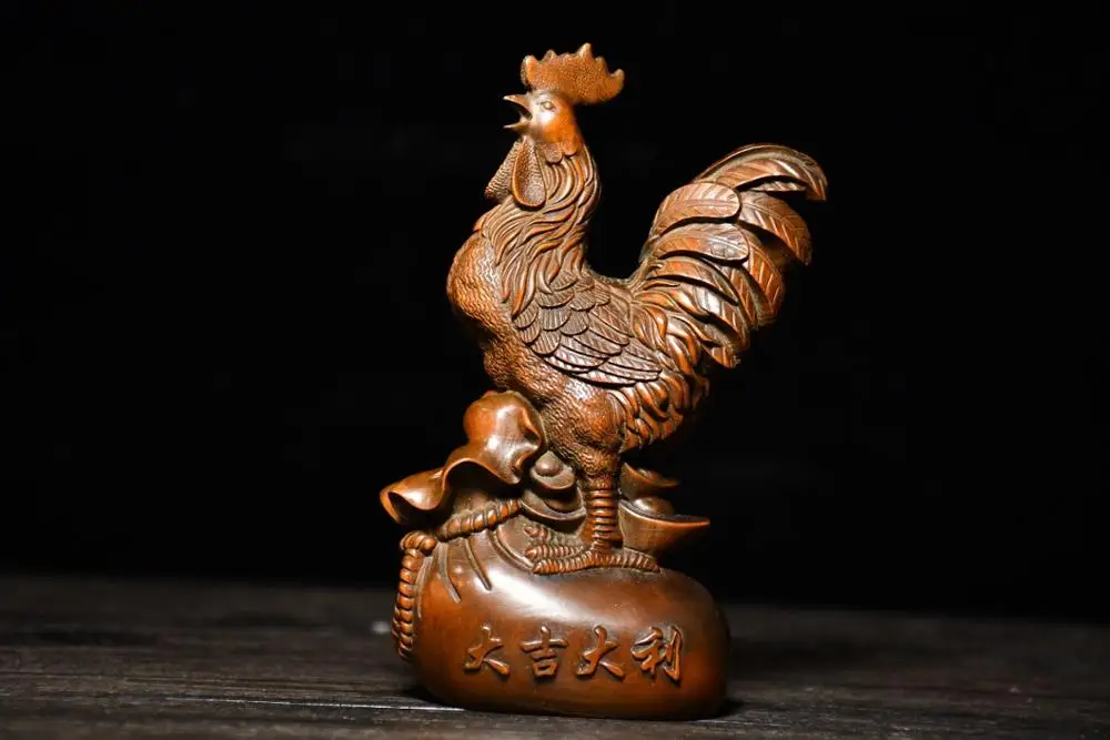 4"Tibet Temple Collection Old Boxwood Chinese Zodiac Chicken Statue Rooster ingot wood carving Implying fortune and treasure
4"Tibet Temple Collection Old Boxwood Chinese Zodiac Chicken Statue Rooster ingot wood carving Implying fortune and treasure
