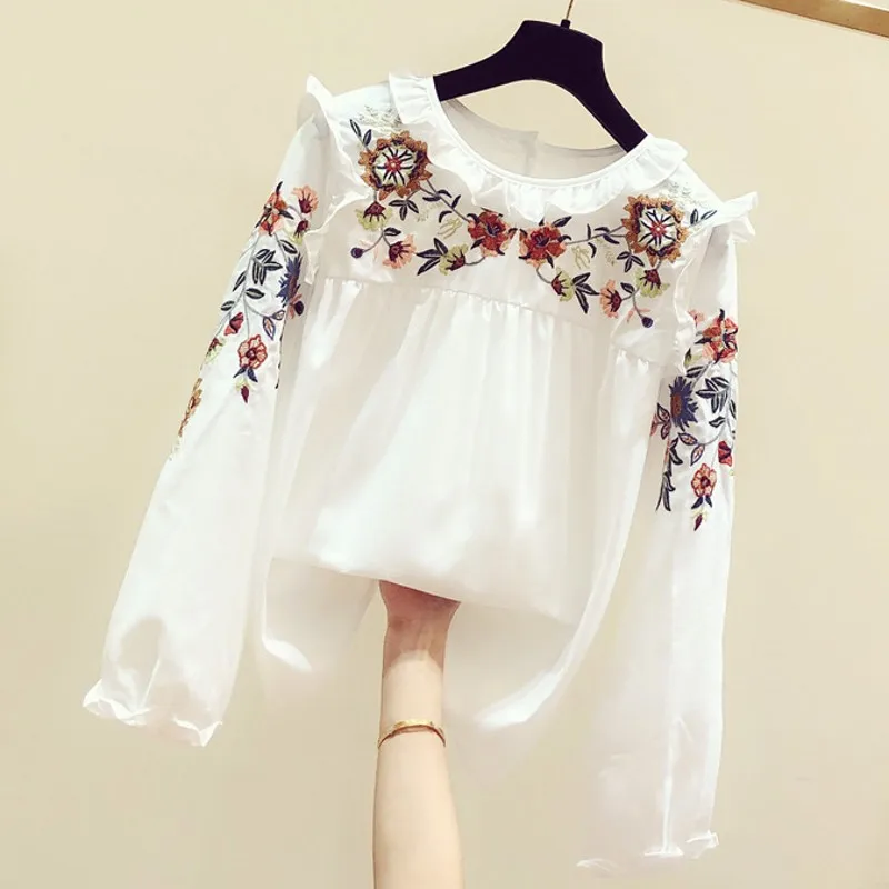 2020 Spring New Hand Embroidered Floral Round-Neck Long-Sleeve Ruffle Shirt Women's Casual Shirts Girls Students White Blouse 
2020 Spring New Hand Embroidered Floral Round-Neck Long-Sleeve Ruffle Shirt Women's Casual Shirts Girls Students White Blouse
