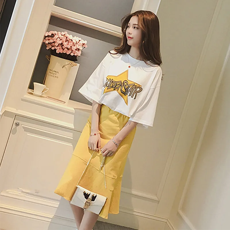 2020 Harajuku summer dress new female casual suit printed short-sleeved t-shirt top lotus leaf skirt two-piece suit 
2020 Harajuku summer dress new female casual suit printed short-sleeved t-shirt top lotus leaf skirt two-piece suit