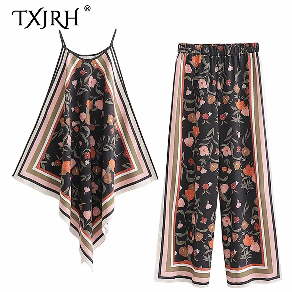 TXJRH 2019 Vintage Bohemia Ethnic Floral Print Spaghetti Strap Irregular Hem Tops Elastic Waist Wide Leg Pants 2 Pieces Sets
TXJRH 2019 Vintage Bohemia Ethnic Floral Print Spaghetti Strap Irregular Hem Tops Elastic Waist Wide Leg Pants 2 Pieces Sets