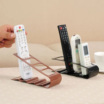 Four Remote Control Frame Practical Remote Control Bracket Classic Plastic Shelf Mobile Phone Holder Stand Rack Up Products
Four Remote Control Frame Practical Remote Control Bracket Classic Plastic Shelf Mobile Phone Holder Stand Rack Up Products