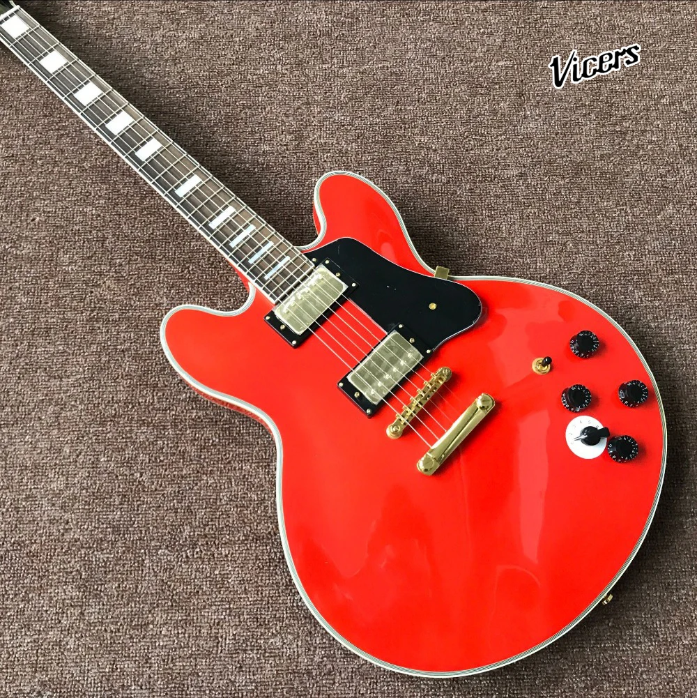 New Style Rosewood fingerboard jazz Electric Guitar.Red color top jazz guitarra.gold hardware .support customization
New Style Rosewood fingerboard jazz Electric Guitar.Red color top jazz guitarra.gold hardware .support customization