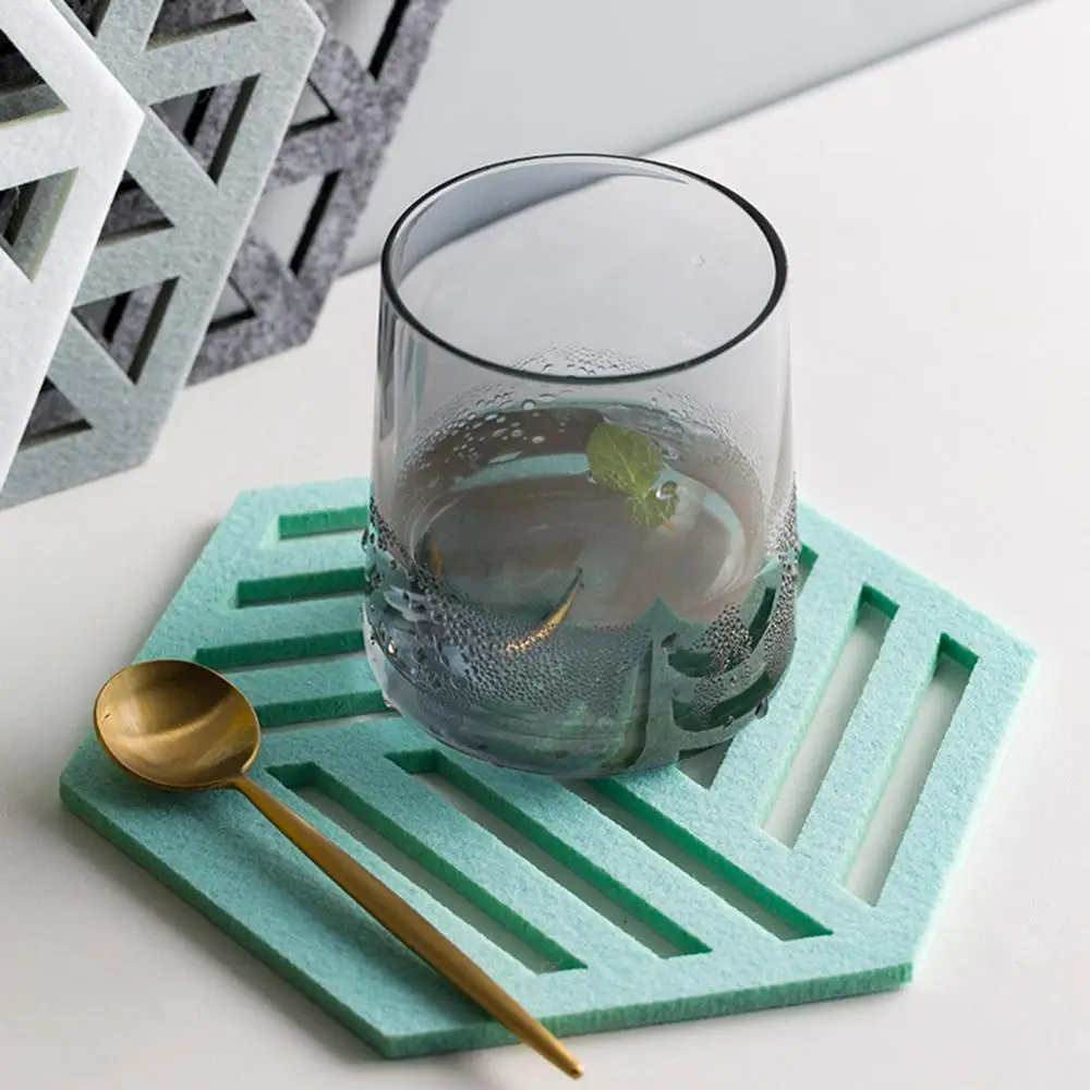 10 Styles Creative Felt Coaster Hexagon Hollow Cup Mat Soft Heat Insulated Non Slip Pad Home Hot Drink Holder Desktop Decoration
10 Styles Creative Felt Coaster Hexagon Hollow Cup Mat Soft Heat Insulated Non Slip Pad Home Hot Drink Holder Desktop Decoration