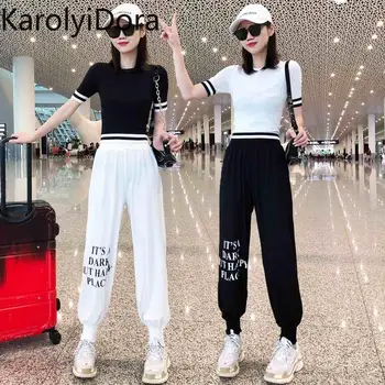 Women's suit 2020 summer new knitted letters contrast color stitching casual was thin two-piece short-sleeved top + pants
Women's suit 2020 summer new knitted letters contrast color stitching casual was thin two-piece short-sleeved top + pants