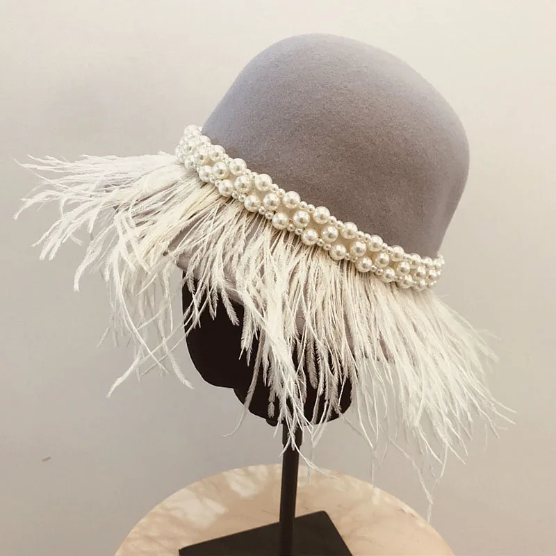 New Women Wool Felt Wide Brim Fedora Hats Feather Pearls Trimmed Fashion Winter Hats Floppy Bowlers Lady Trilby Dress Church Hat
New Women Wool Felt Wide Brim Fedora Hats Feather Pearls Trimmed Fashion Winter Hats Floppy Bowlers Lady Trilby Dress Church Hat