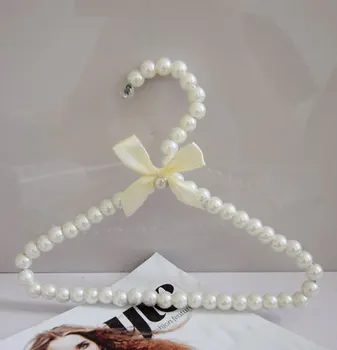5/10pcs 20cm Plastic Pearl Beaded Bow Clothes Dress Coat Hangers Weding For Kid Children
5/10pcs 20cm Plastic Pearl Beaded Bow Clothes Dress Coat Hangers Weding For Kid Children