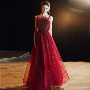 The bride's long - style temperament strapless with feather wine - red dress
The bride's long - style temperament strapless with feather wine - red dress