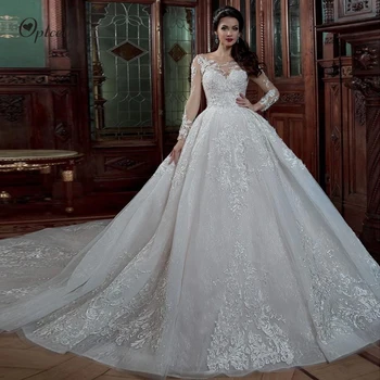 Optcely Luxury Scoop Neck Sexy Backless Long Sleeves Ball Gown Wedding Dresses 2019 New Lace Up Appliques Beading Princess Gowns
Optcely Luxury Scoop Neck Sexy Backless Long Sleeves Ball Gown Wedding Dresses 2019 New Lace Up Appliques Beading Princess Gowns