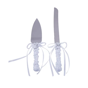 1 set of 2 silver stainless steel bow knees love lace cutlery cutlery wedding supplies cake knife set: a cake knife 32 * 2.5cm, 
1 set of 2 silver stainless steel bow knees love lace cutlery cutlery wedding supplies cake knife set: a cake knife 32 * 2.5cm,