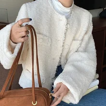 2021 New Korea Chic Autumn and Winter Temperament Round Neck Single-breasted Loose Thick Warmth Imitation Lamb Fur Coat Women 
2021 New Korea Chic Autumn and Winter Temperament Round Neck Single-breasted Loose Thick Warmth Imitation Lamb Fur Coat Women