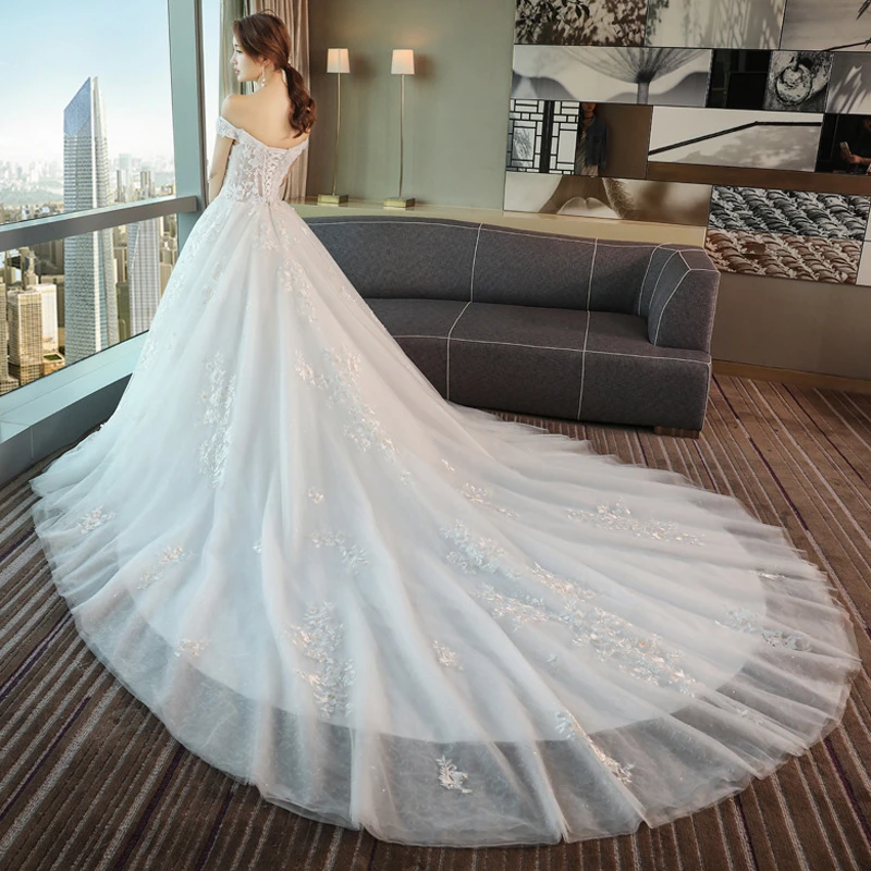 2019 Autumn New Short Sleeves Cathedral Train applique Beads Lace Wedding Dress Boat Neck robe de mariee Vestido De Novia
2019 Autumn New Short Sleeves Cathedral Train applique Beads Lace Wedding Dress Boat Neck robe de mariee Vestido De Novia