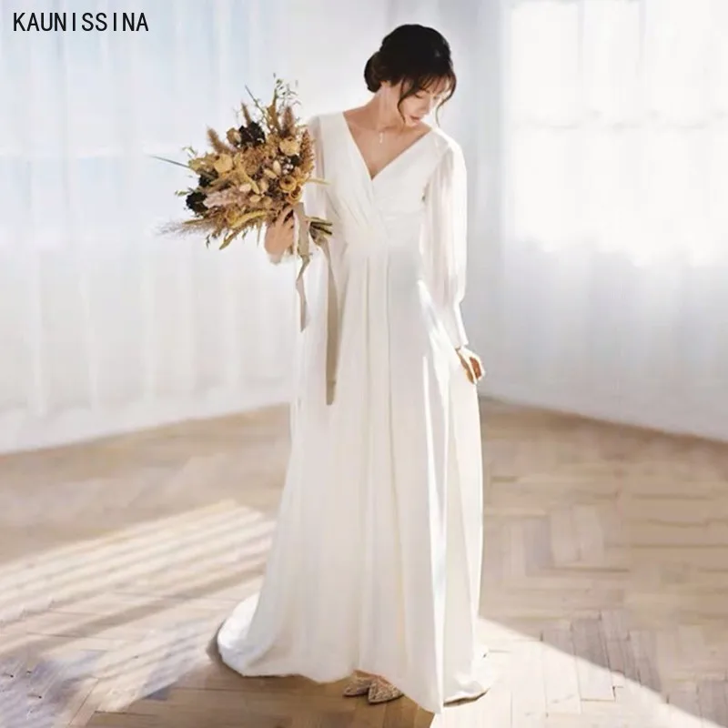 KAUNISSINA V-Neck Bride Wedding Gowns Long Sleeves A-Line Sweep Train Bridal Dresses Backless Long White Marriage Dress Vestido
KAUNISSINA V-Neck Bride Wedding Gowns Long Sleeves A-Line Sweep Train Bridal Dresses Backless Long White Marriage Dress Vestido