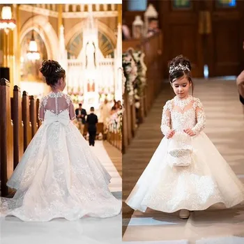 Ivory White Lace Applique Flower Girl Dress for Wedding Long Sleeves O Neck Kids First Communion Dress with Bow 
Ivory White Lace Applique Flower Girl Dress for Wedding Long Sleeves O Neck Kids First Communion Dress with Bow
