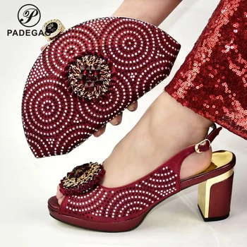 Wine Color New Design Nigerian Women Shoes Matching Bag with Shinning Crystal Italian Lady Shoes and Bag Set for Wedding Party 
Wine Color New Design Nigerian Women Shoes Matching Bag with Shinning Crystal Italian Lady Shoes and Bag Set for Wedding Party