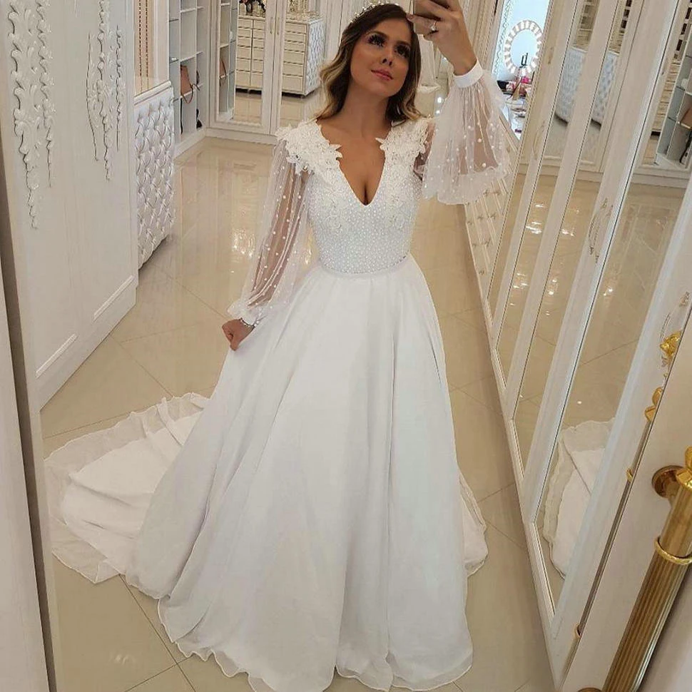 Graceful Long Llusion Sleeves Chiffon Wedding Dress A-line V-neck 3D Flowers Floor-length Dress with Beading and Train 
Graceful Long Llusion Sleeves Chiffon Wedding Dress A-line V-neck 3D Flowers Floor-length Dress with Beading and Train