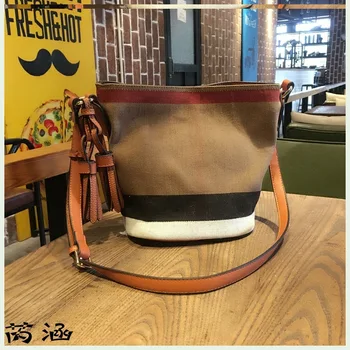Luxury bag women 2020 new striped one-shoulder shoulder bag European and American fashion tassel canvas bucket bag girl
Luxury bag women 2020 new striped one-shoulder shoulder bag European and American fashion tassel canvas bucket bag girl